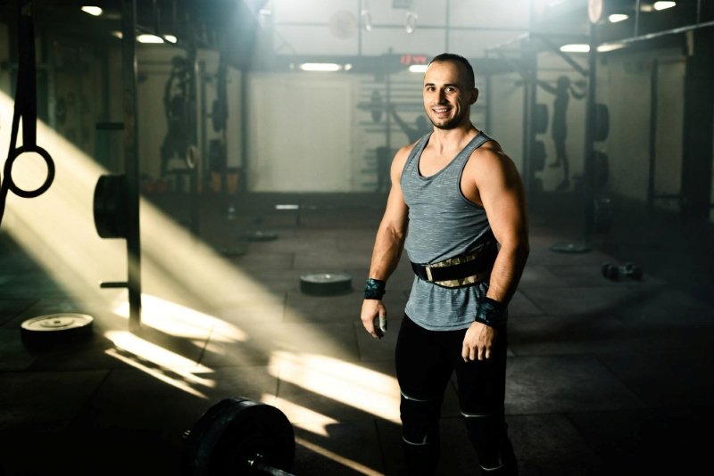 Young man achieving weight loss USA weight drop with fitness routine"