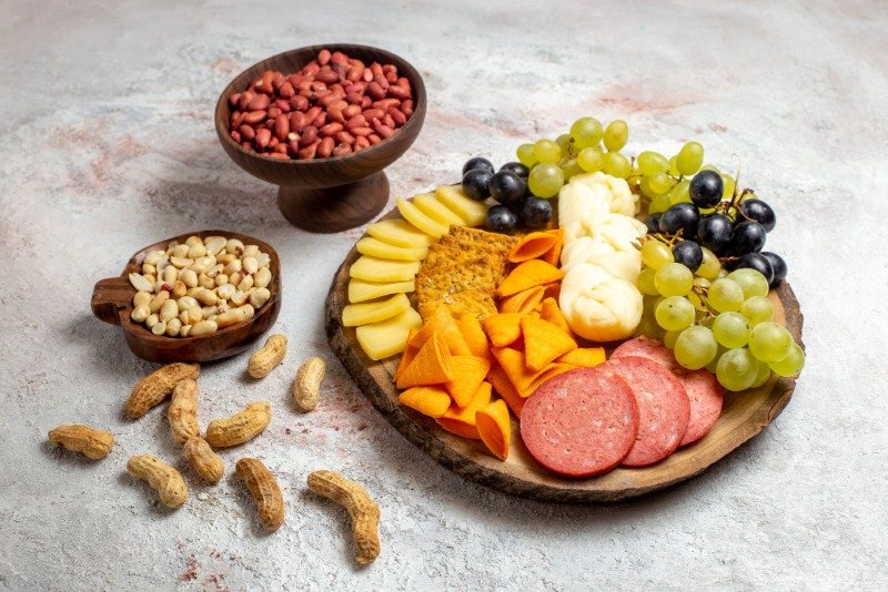 Nutritious snacks including fruits, nuts, and vegetables for steady energy