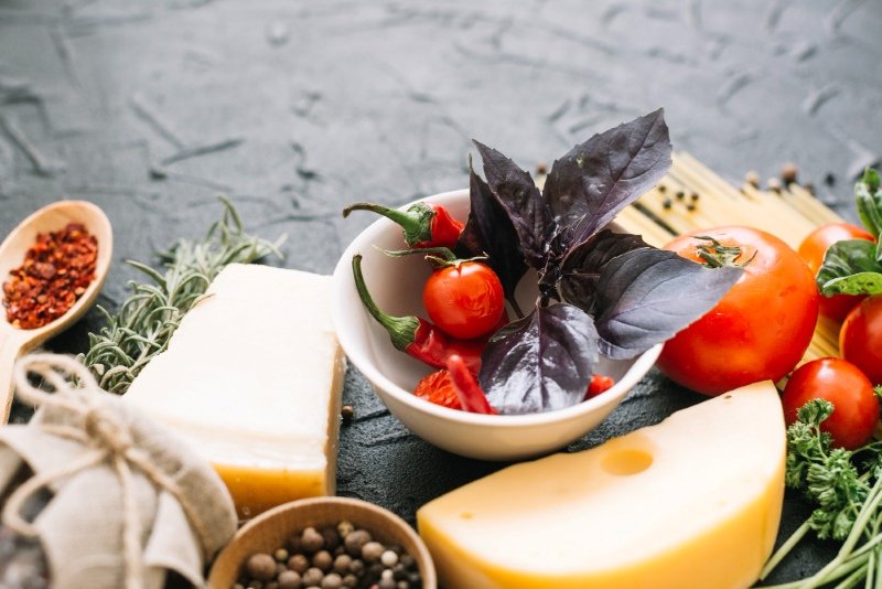 Mediterranean diet meal plan USA grocery shopping with vegetables, fish, olive oil and whole grains