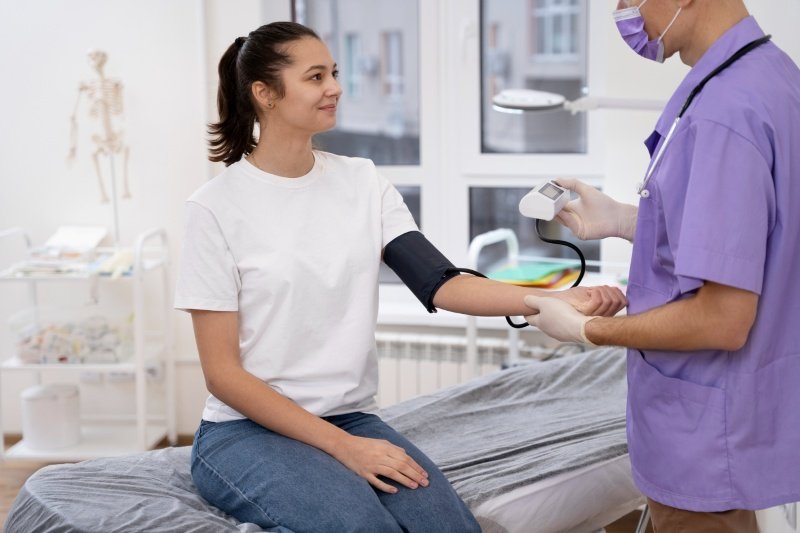 Correct way to measure blood pressure at home with proper posture and cuff placement