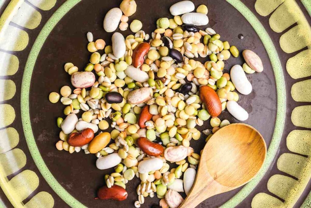 colorful diverse salad demonstrating how to blend the best high-protein meat alternatives for gut health to fuel beneficial gut strains.